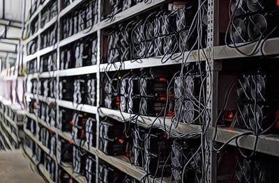 An expansive cryptocurrency mining farm showcasing integrated cooling infrastructure