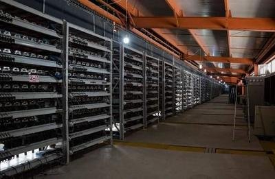 A large-scale mining farm filled with Bitcoin and Ethereum mining equipment